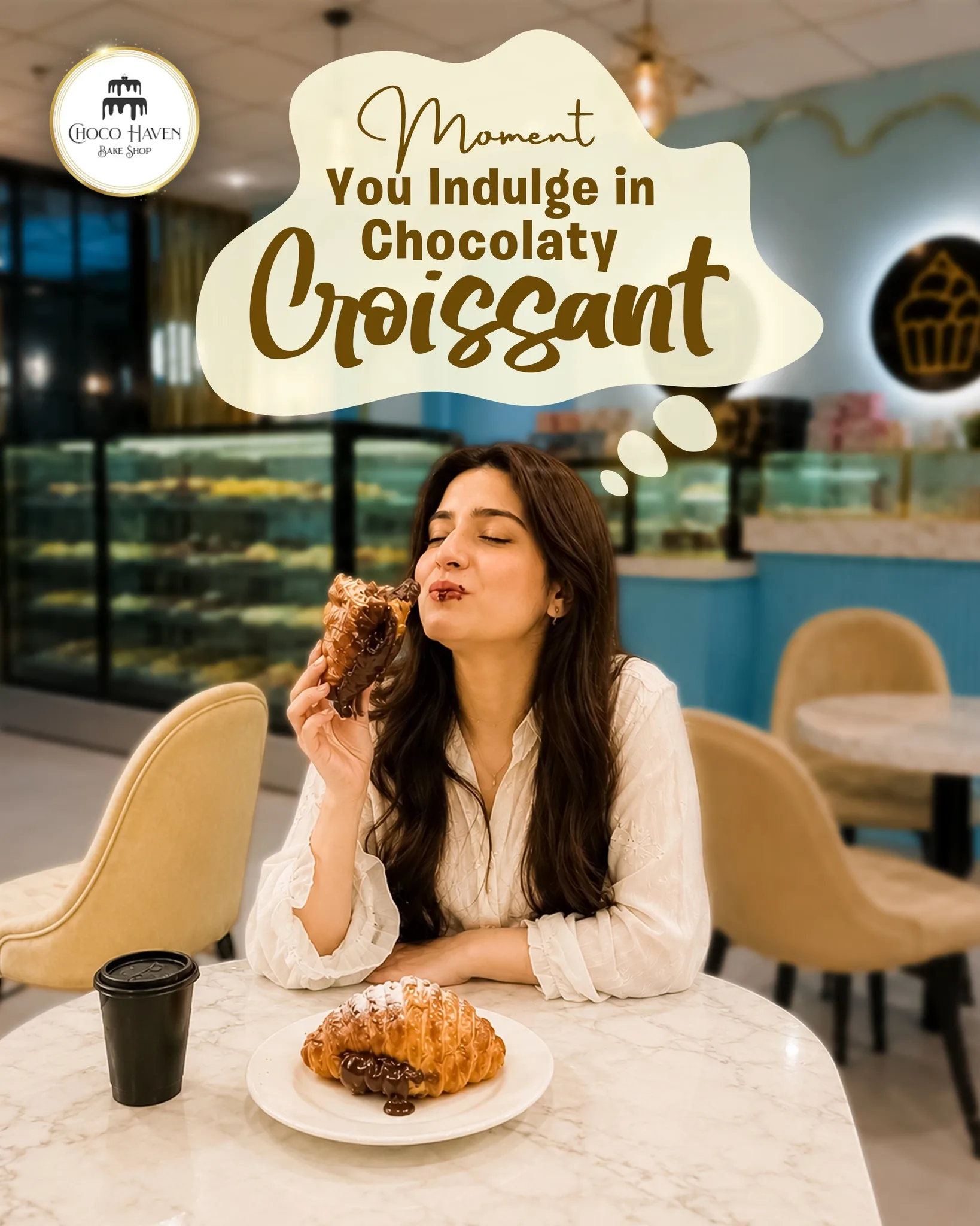 Guest enjoying a croissant at Choco Haven